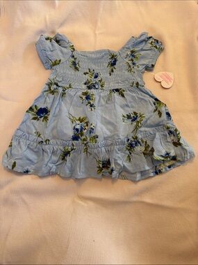 Blue Floral Smocked Baby Dress
The Children’s Place